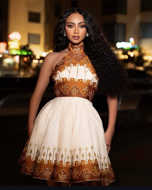 Graceful Simplicity in Golden Habesha Dress
