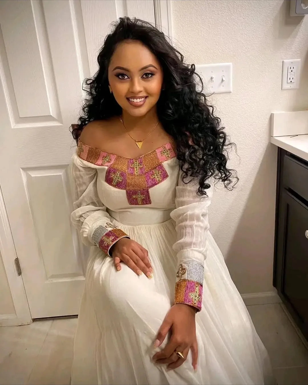 Flawless Craftmanship on Traditional Dress: Colorful Beaded Cross Designs on Ethiopian Dress for Huge Occasions Habesha Dress