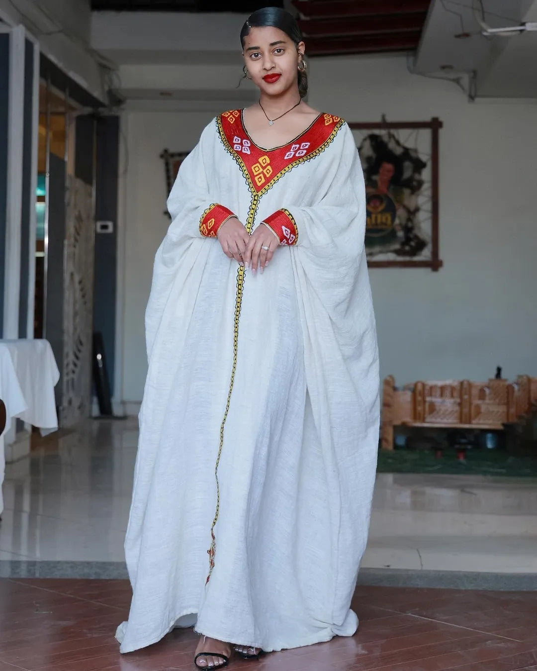 Simple Red Habesha Dress with Eritrean Detail: Traditional Elegance, Embroidered Accents