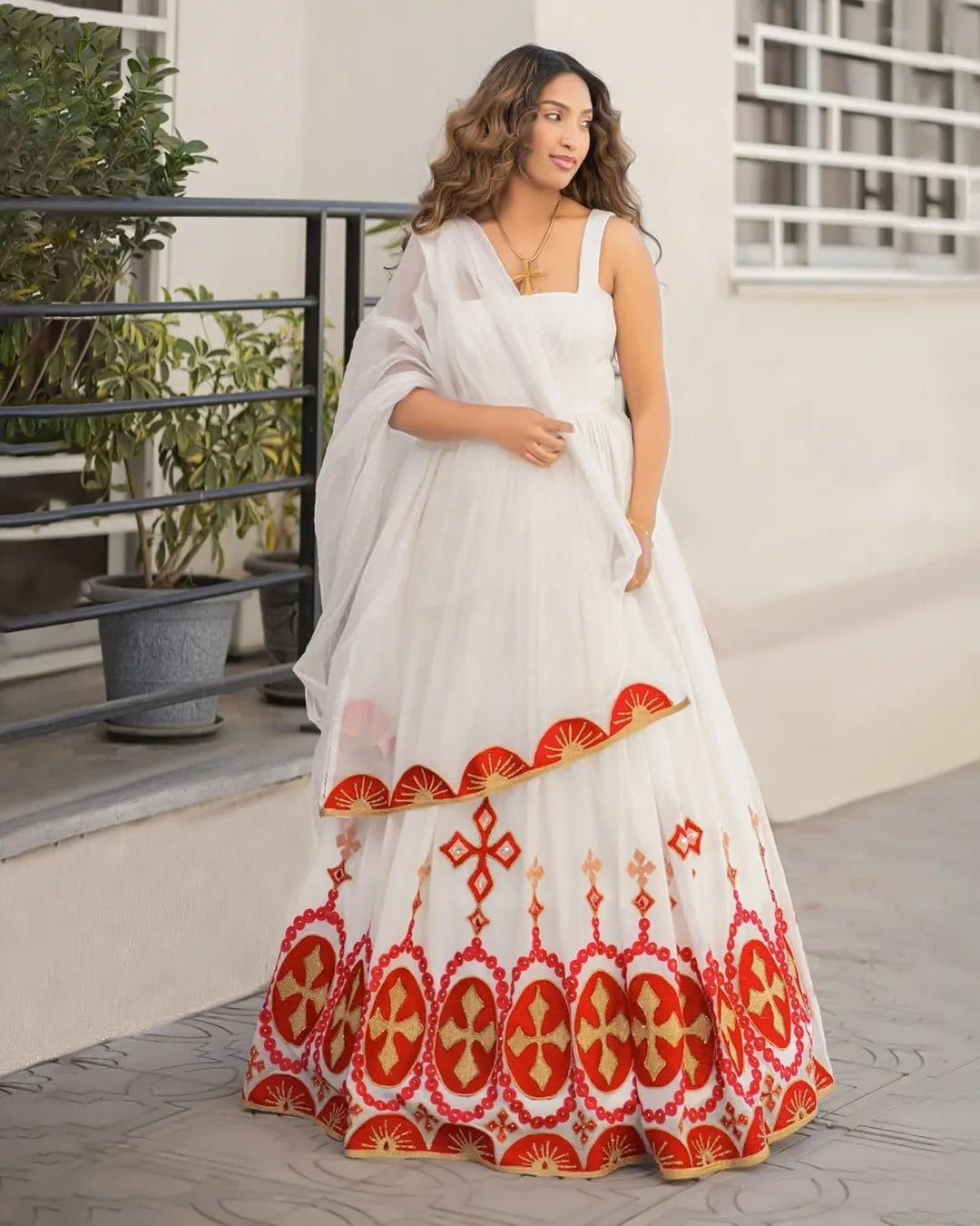 Delightful Red Habesha Dress: Golden Accented Wide Hemline, Traditional Style