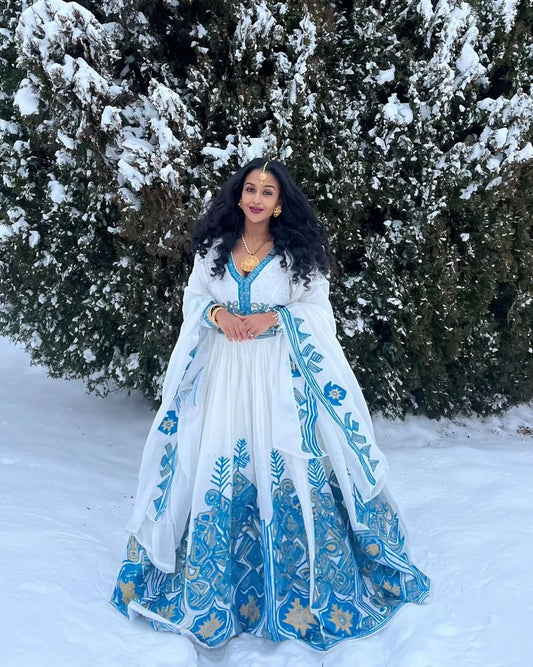 Radiant Habesha Kemis A Stunning Blue Dress for Special Occasions