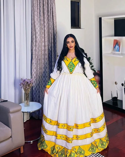Elegant Habesha Kemis Modern Habesha Design Featuring Yellow Accents