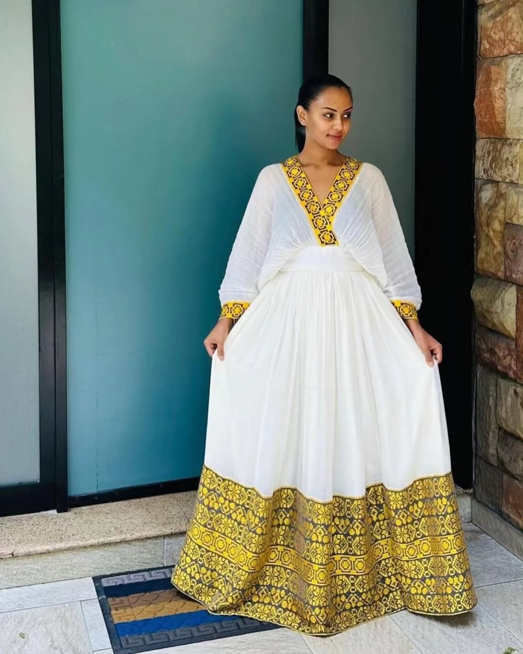 Golden Embellished Habesha Dress Elegant Ethiopian Event Attire