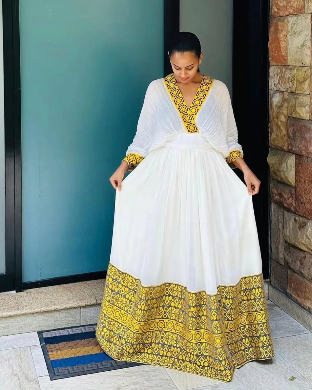 Golden Embellished Habesha Dress Elegant Ethiopian Event Attire