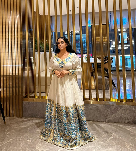 Stunning White Ethiopian Dress Adorned with Blue & Gold Motifs – Habesha Kemis