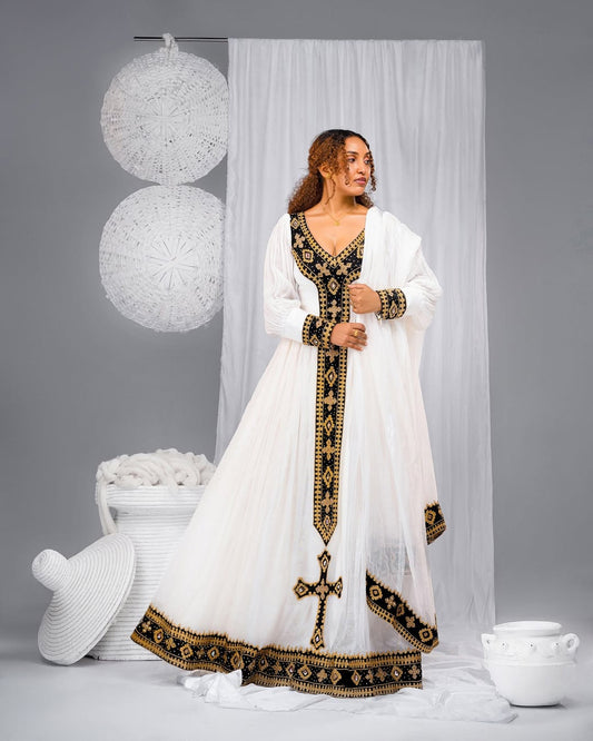 Elegant  Habesha Kemis with Black & Gold Cross Embroidery – Ethiopian Traditional Dress 