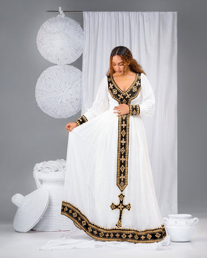 Elegant Habesha Kemis with Black & Gold Cross Embroidery – Ethiopian Traditional Dress