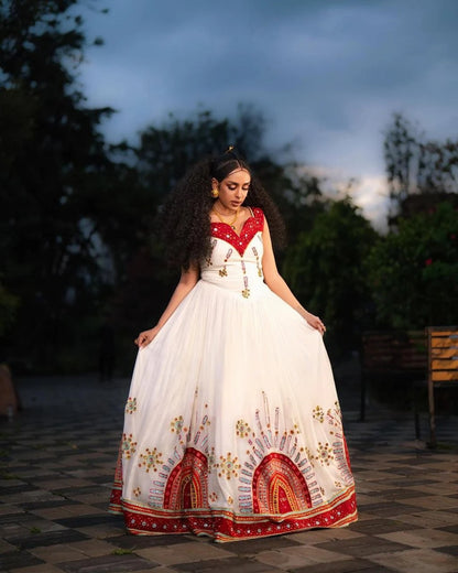 Elegant Habesha Dress with Vibrant Red and Gold Embroidery for Weddings
