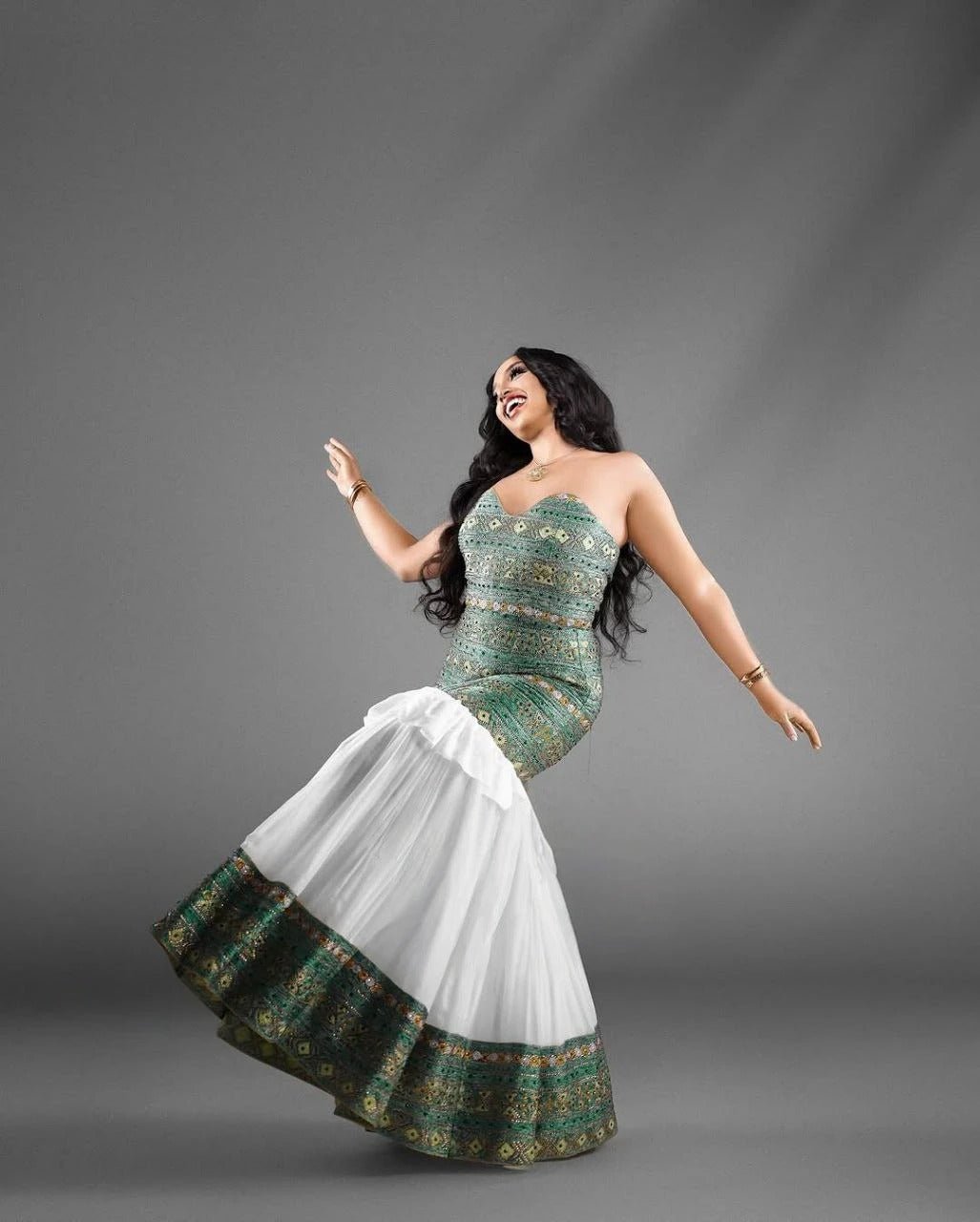 Elegant Strapless Modern Habesha Dress with Green and Gold Design for special occasion