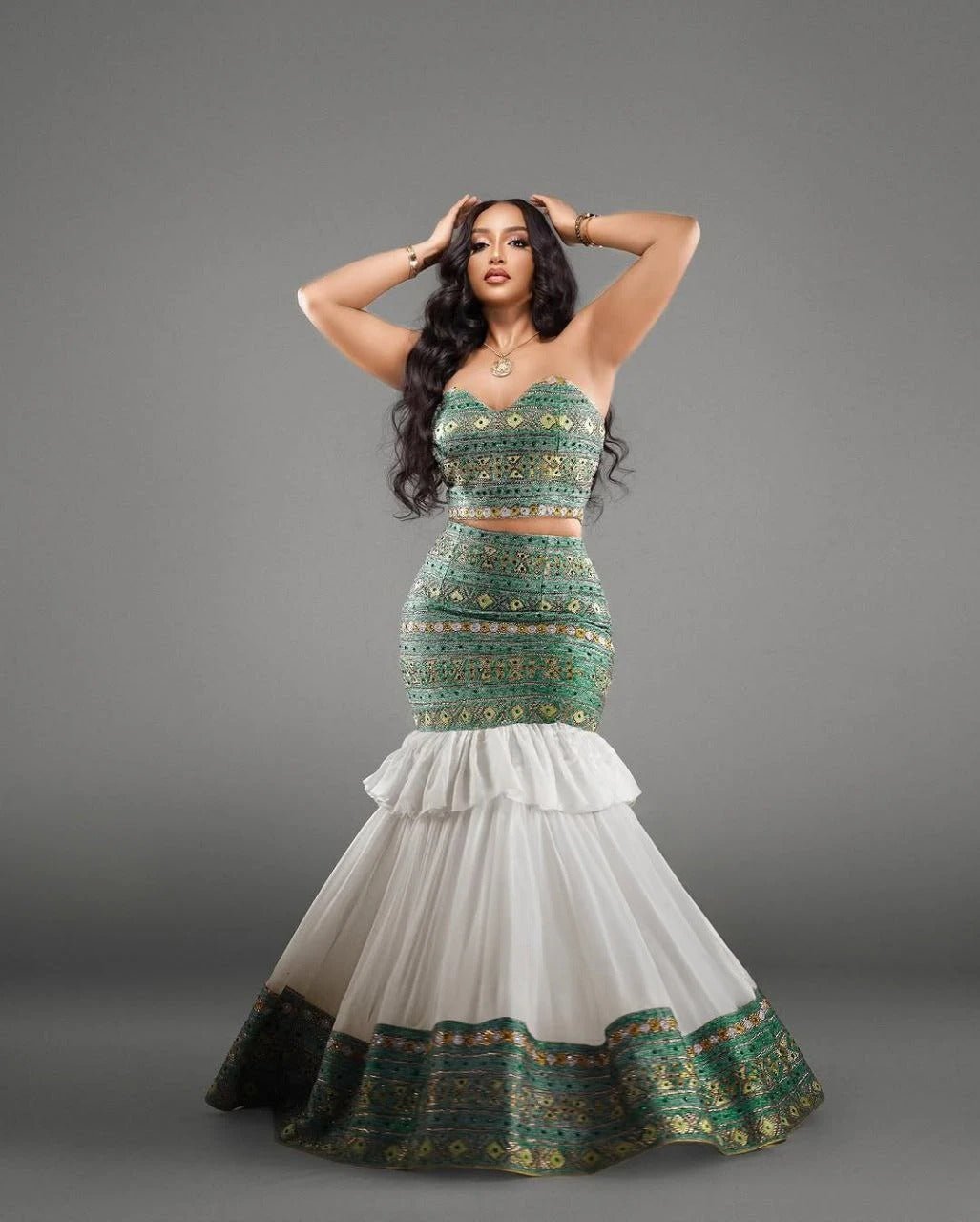 Elegant Strapless Modern Habesha Dress with Green and Gold Design for special occasion

