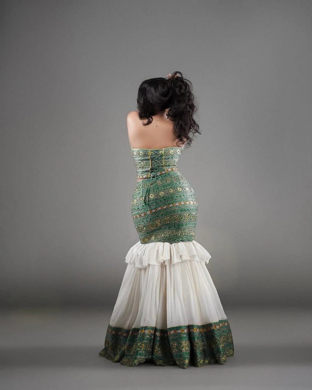 Elegant Strapless Modern Habesha Dress with Green and Gold Design for special occasion