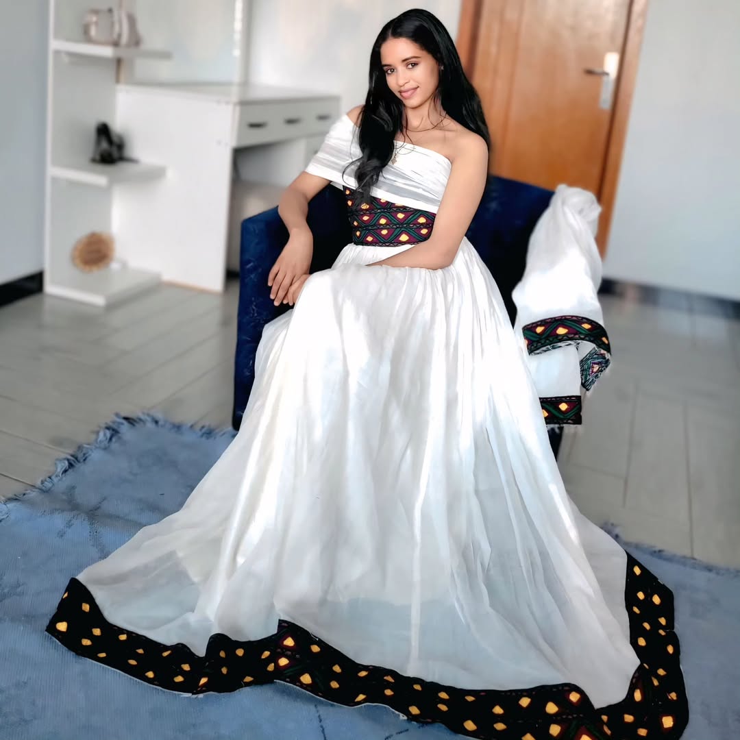 Beautiful Habesha Dress with Colorful Accents for Celebration