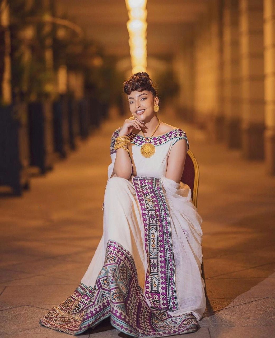 Radiant Purple Majesty: Modern Menen Fabric in Habesha Kemis