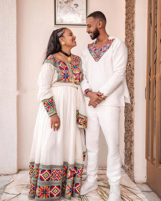 Modern vibrant habesha couples outfit simple multi-colored Ethiopian couples outfit