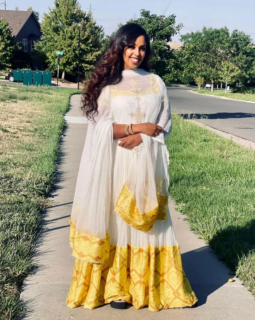 Habesha Dress – White off shoulder Style with Golden Yellow Borders for Meskel Festival