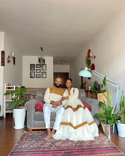 Appealing Yellow Matching Habesha Couples Outfit: Ideal for Cultural Celebrations Traditional Ethiopian Couples Attire