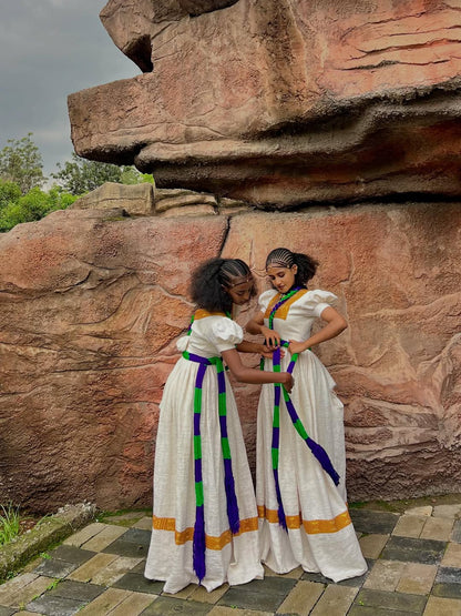 Simple Ashenda Kemis with Yellow and Gold Accents for Cultural Celebration