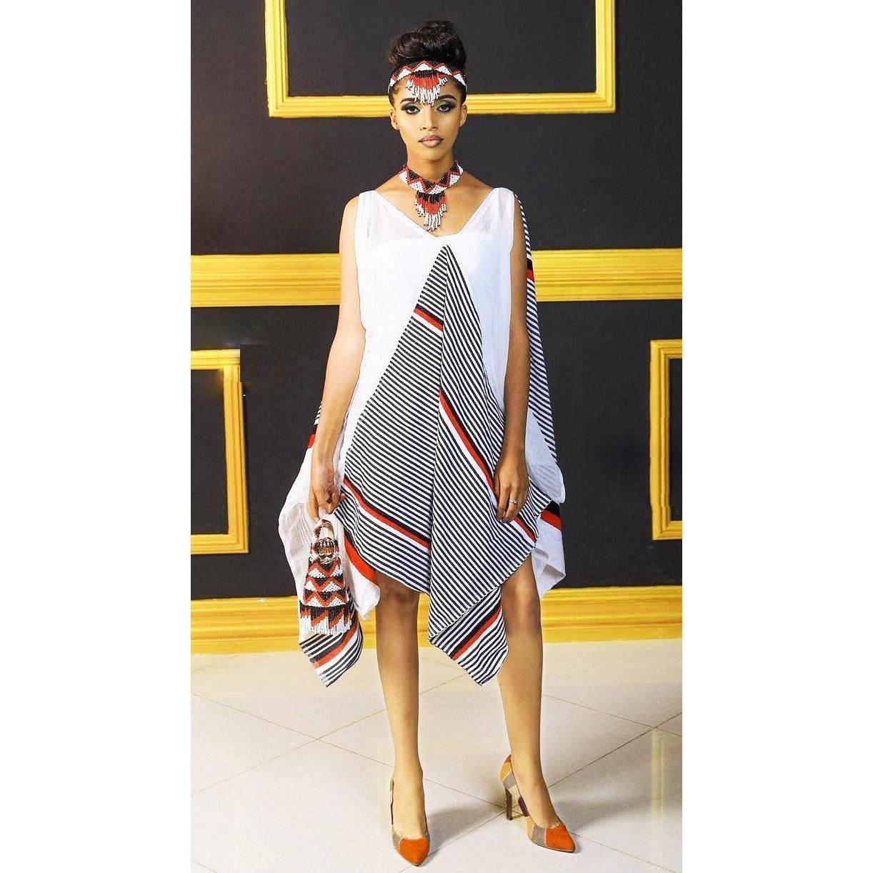 A Modern Abbaa Gadaa Oromo Dress With Accessories
