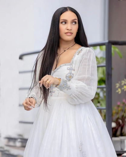 Handwoven Modern Ethiopian Wedding Dress: Majestic Silver Embellishments  Habesha Wedding Dress