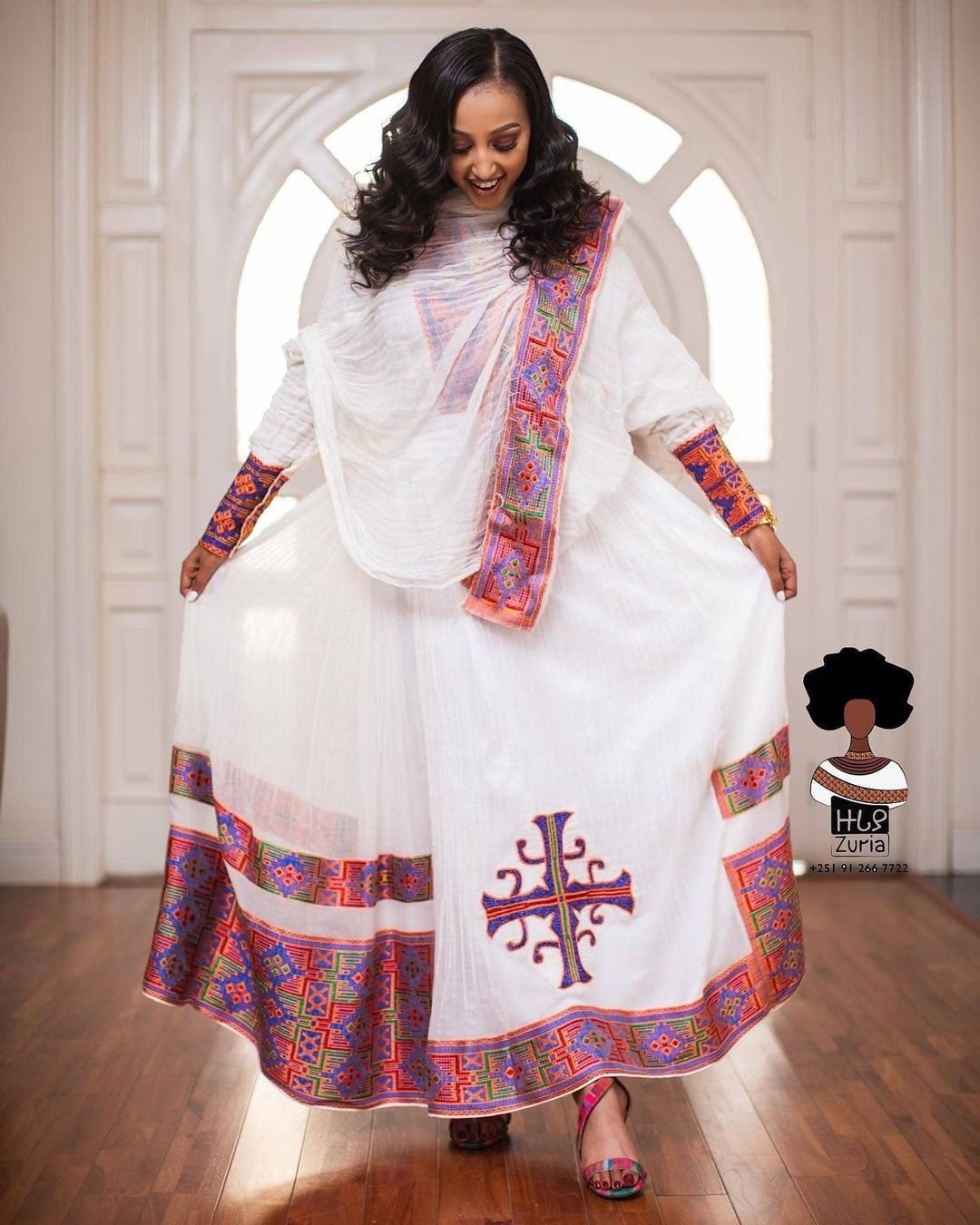 Artistic Elegance: Handwoven Vibrant Habesha Dress in Warm Colors