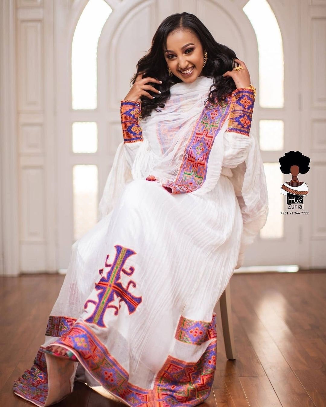Artistic Elegance: Handwoven Vibrant Habesha Dress in Warm Colors