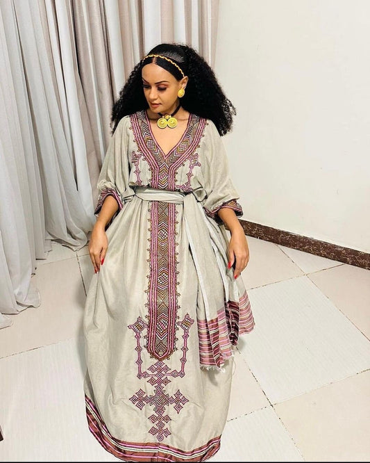 Pink Embroidered Habesha Dress - Embrace Timeless Beauty with Exquisite Cross Patterns