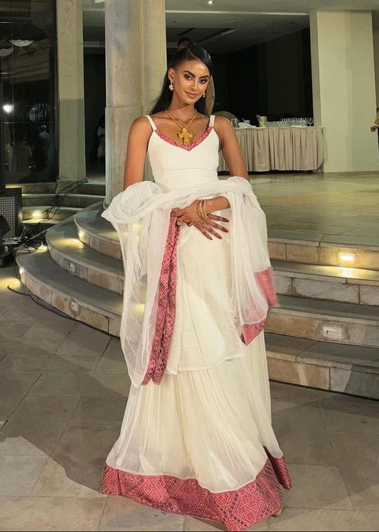 Elegant Light Pink Habesha Kemis Handwoven Habesha Dress with Exquisite Embroidery