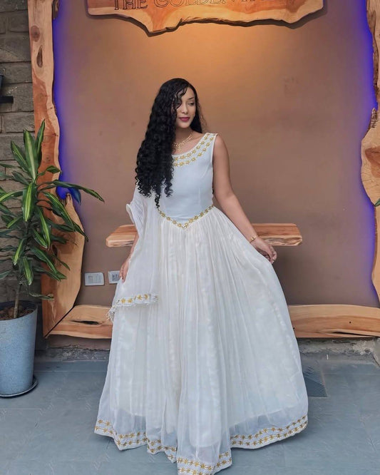 White Habesha Kemis with Gold Embroidery – Elegant Ethiopian Dress