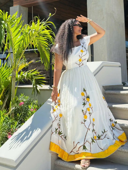 Yellow Floral Habesha Kemis – Ethiopian Traditional Dress with Nature-Inspired Embroidery
