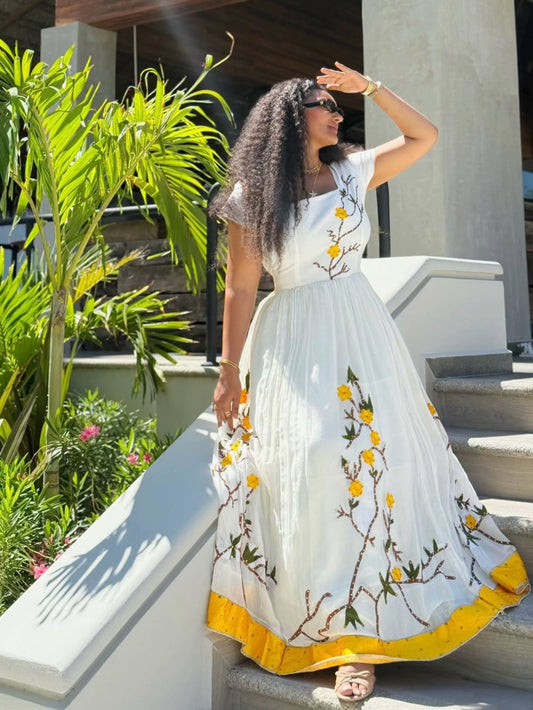 Yellow Floral Habesha Kemis – Ethiopian Traditional Dress with Nature-Inspired Embroidery
