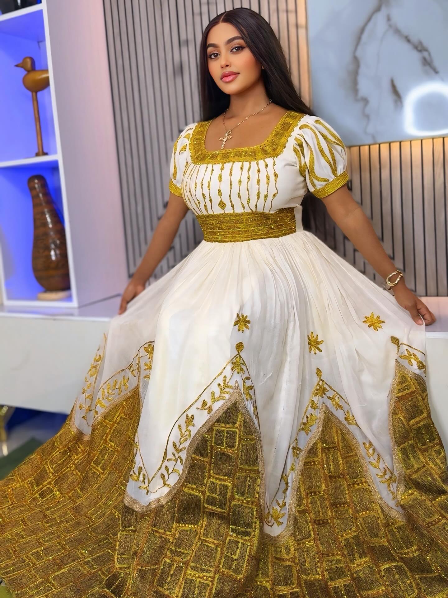 Elegant Habesha Kemis – Golden Embroidered Traditional Ethiopian Dress