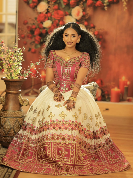  red and gold embroidered traditional ethiopian wedding dress