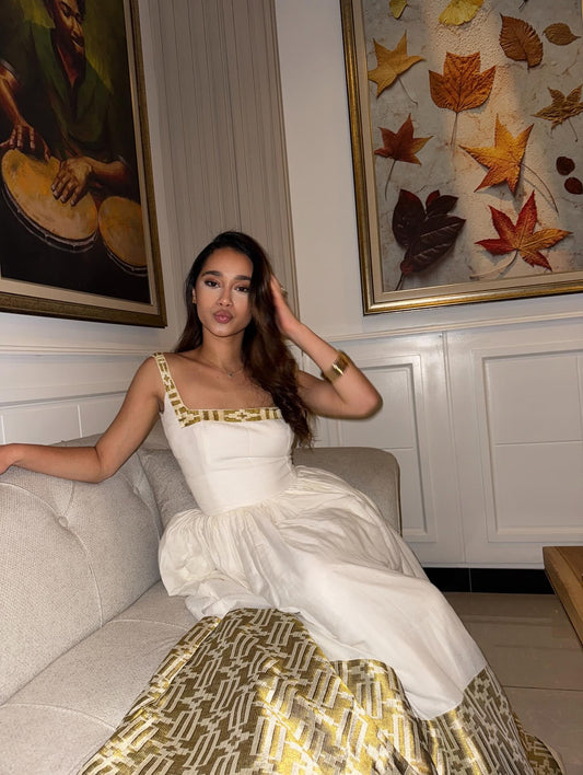 Sleeveless white and gold Ethiopian dress modern design on habesha cloth