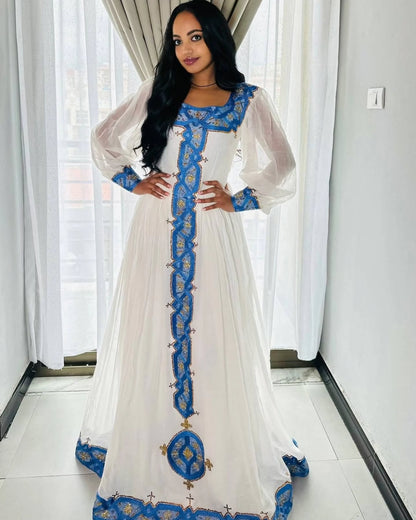 White habesha dress with blue and gold embroidery elegant Ethiopian traditional dress 