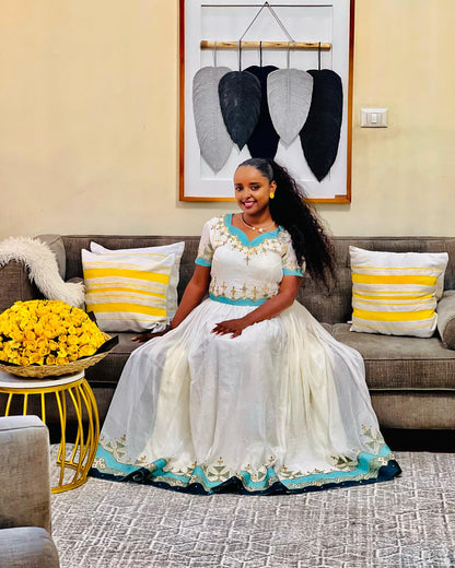 Elegant Habesha Kemis – Traditional Ethiopian Dress with Turquoise Detailing
