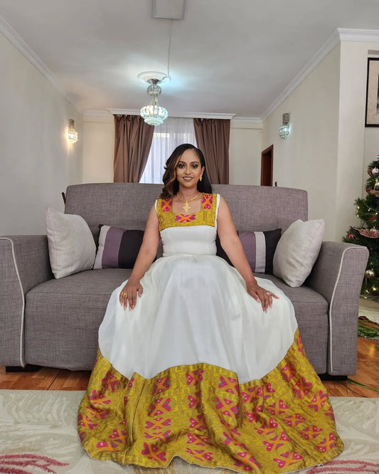 Elegant Ethiopian Traditional Dress – Modern Habesha Dress with Golden Embroidery