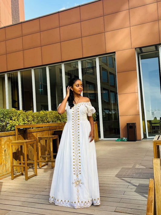 White Off-Shoulder Habesha Kemis with Golden Details