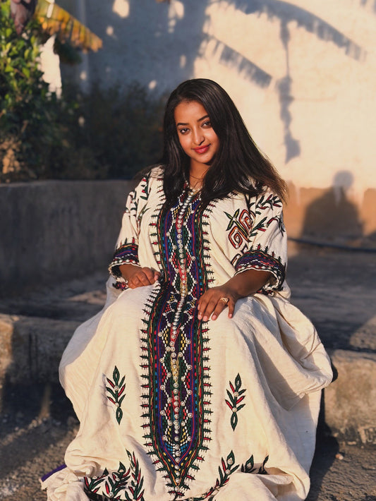 Timeless Habesha Kemis with Rich Multicolor Detailing