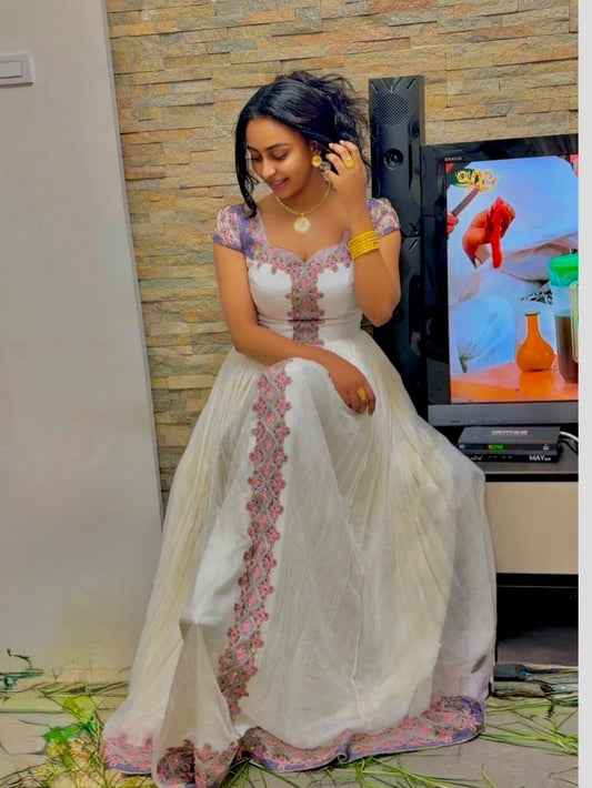 Elegant White Habesha Kemis with Soft Pink Embroidery Timeless Ethiopian Traditional Dress