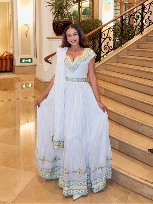 Traditional Ethiopian Clothing | Graceful Habesha Dress with Blue Embroidered Cultural Design