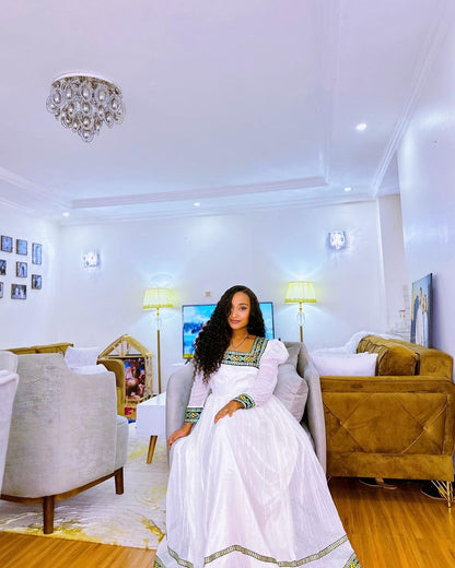 Elegance Redefined: Modern Beauty in Handwoven Habesha Dress with Menen Fabric