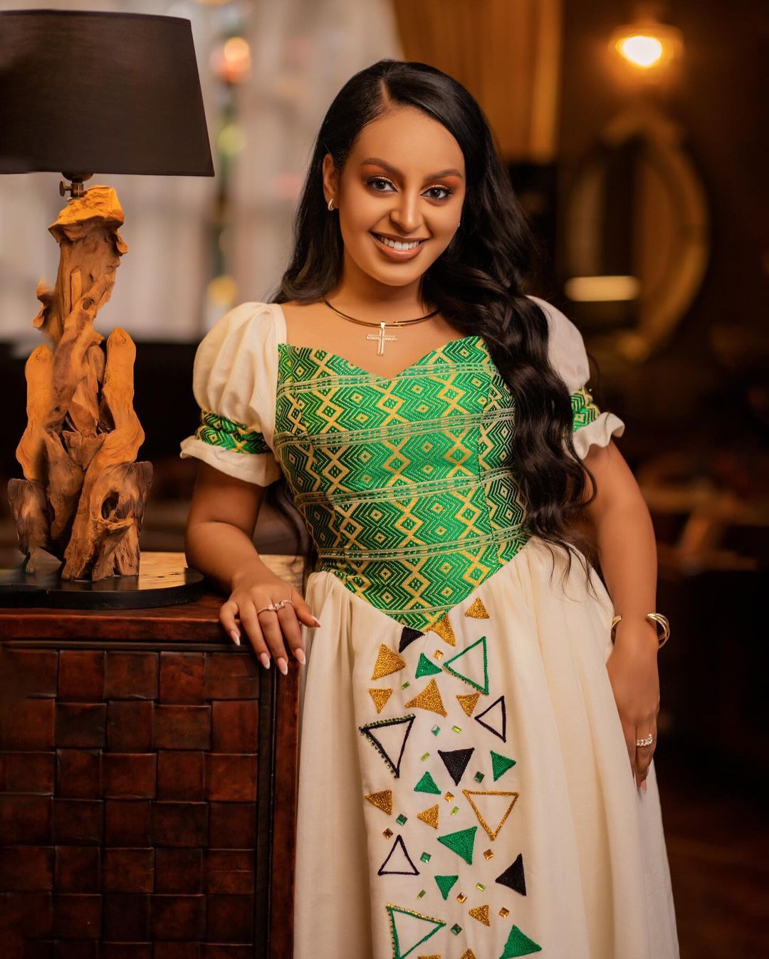 Contemporary Elegance: Habesha Wedding Attire with Modern Green Designs for Ethiopian Couples