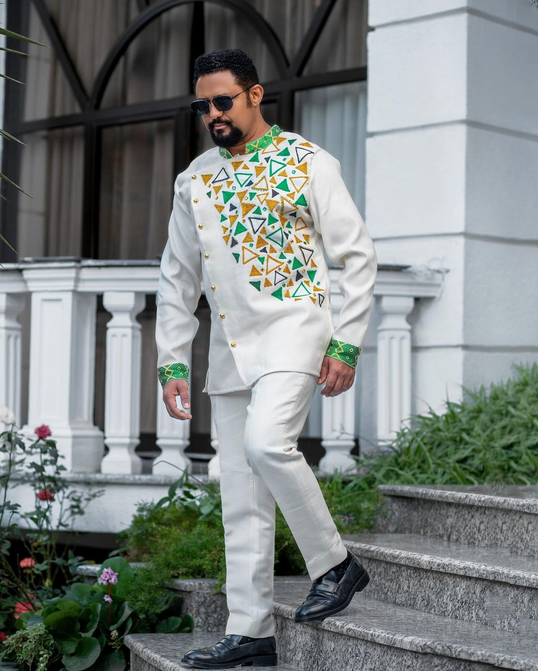 Contemporary Elegance: Habesha Wedding Attire with Modern Green Designs for Ethiopian Couples