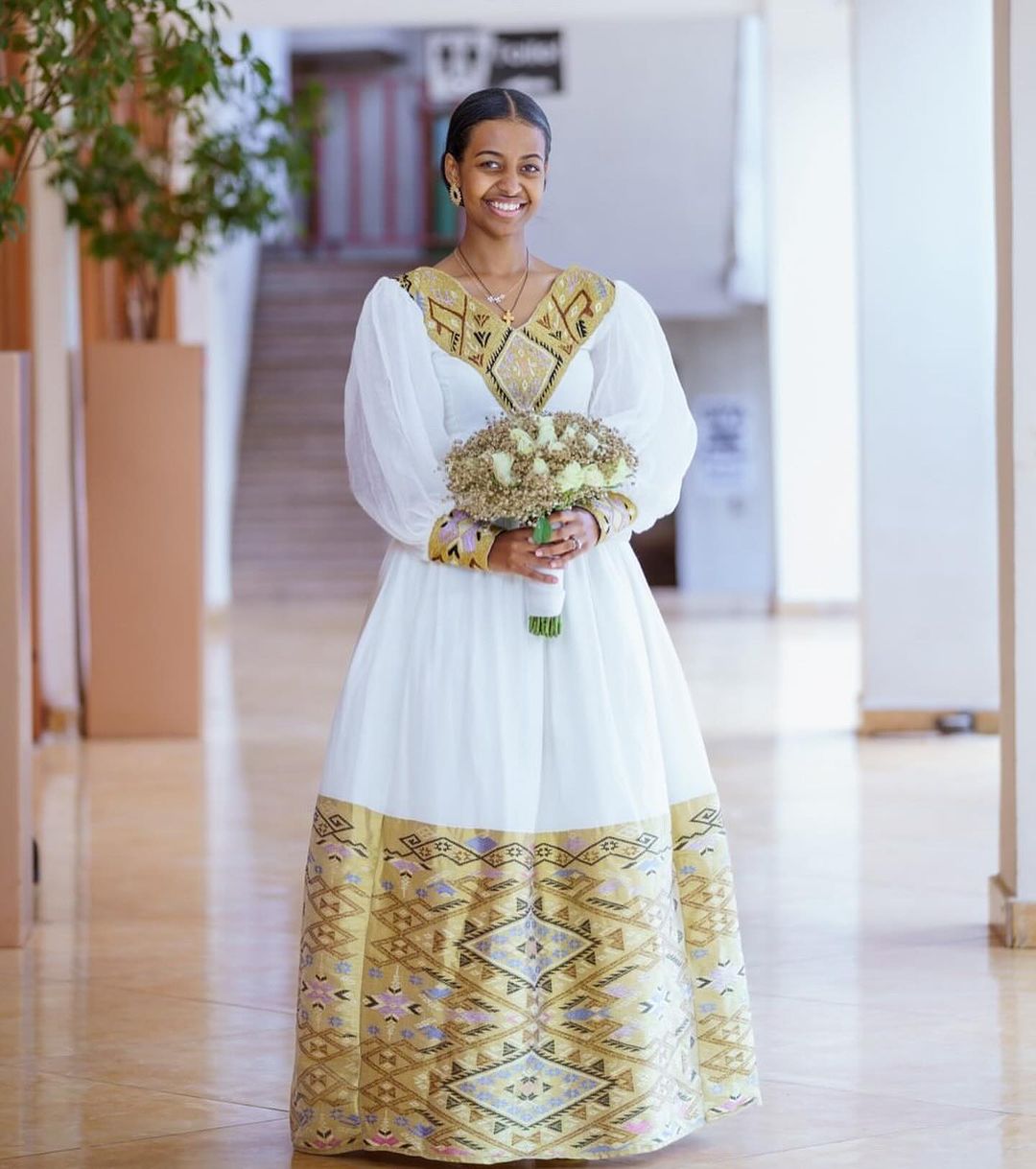 Contemporary Splendor: Modern Elegance in Habesha Couples Wedding Attire