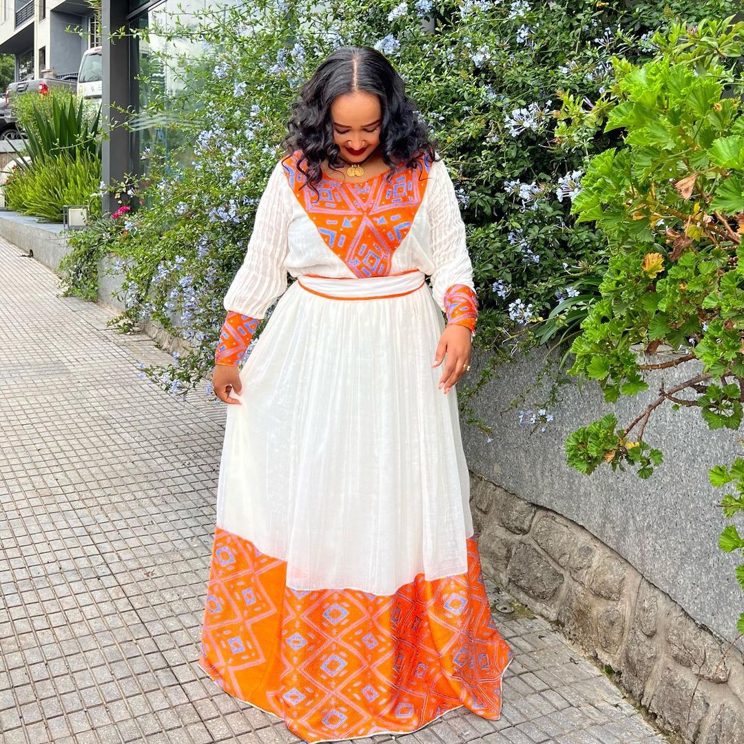 The Simplicity of Orange in the Habesha Kemis Habesha Dress Modern Ethiopian Dress Style