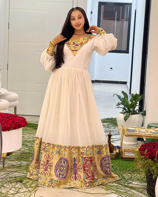Vibrant Elegant Habesha Dress Colorful Detailed Pattern Modern Ethiopian Dress