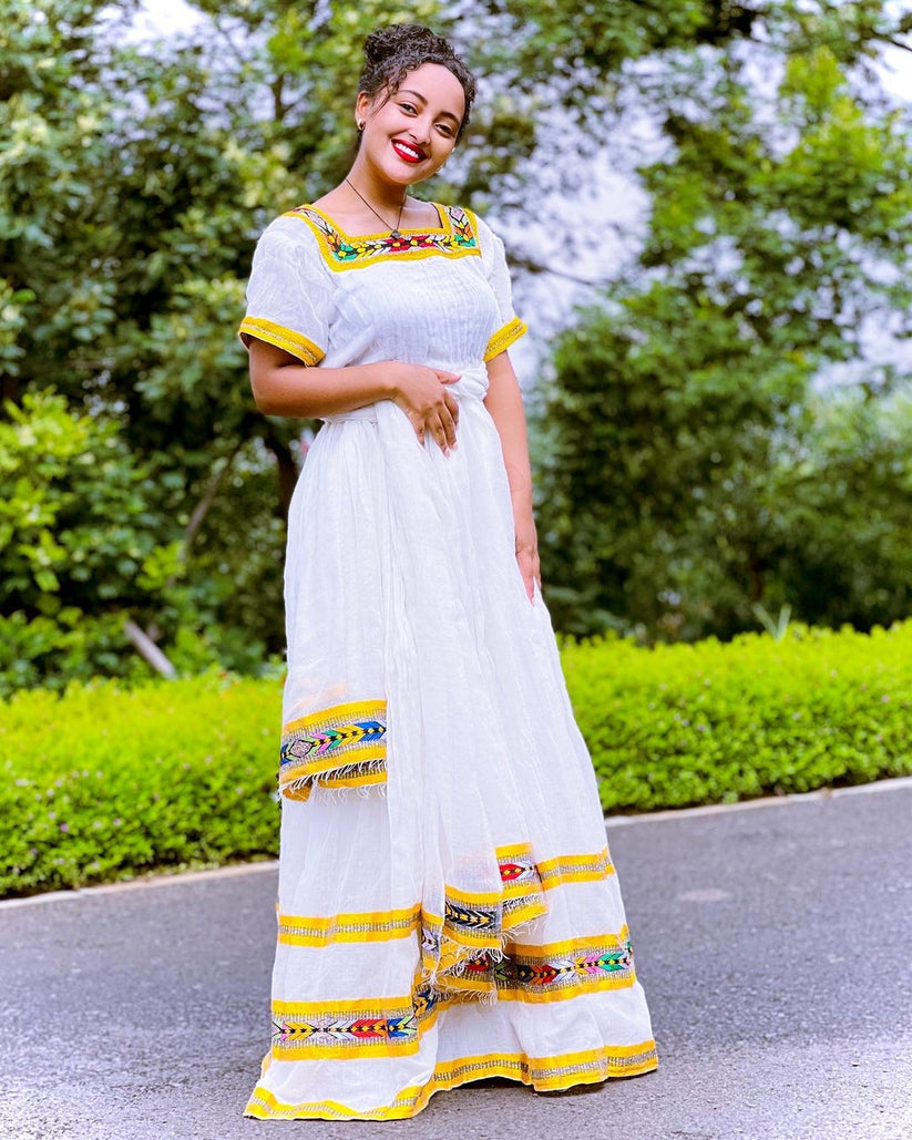 Ethiopian Radiant & Simple Habesha Dress – Traditional Kemis with Yellow Tibeb Embroidery