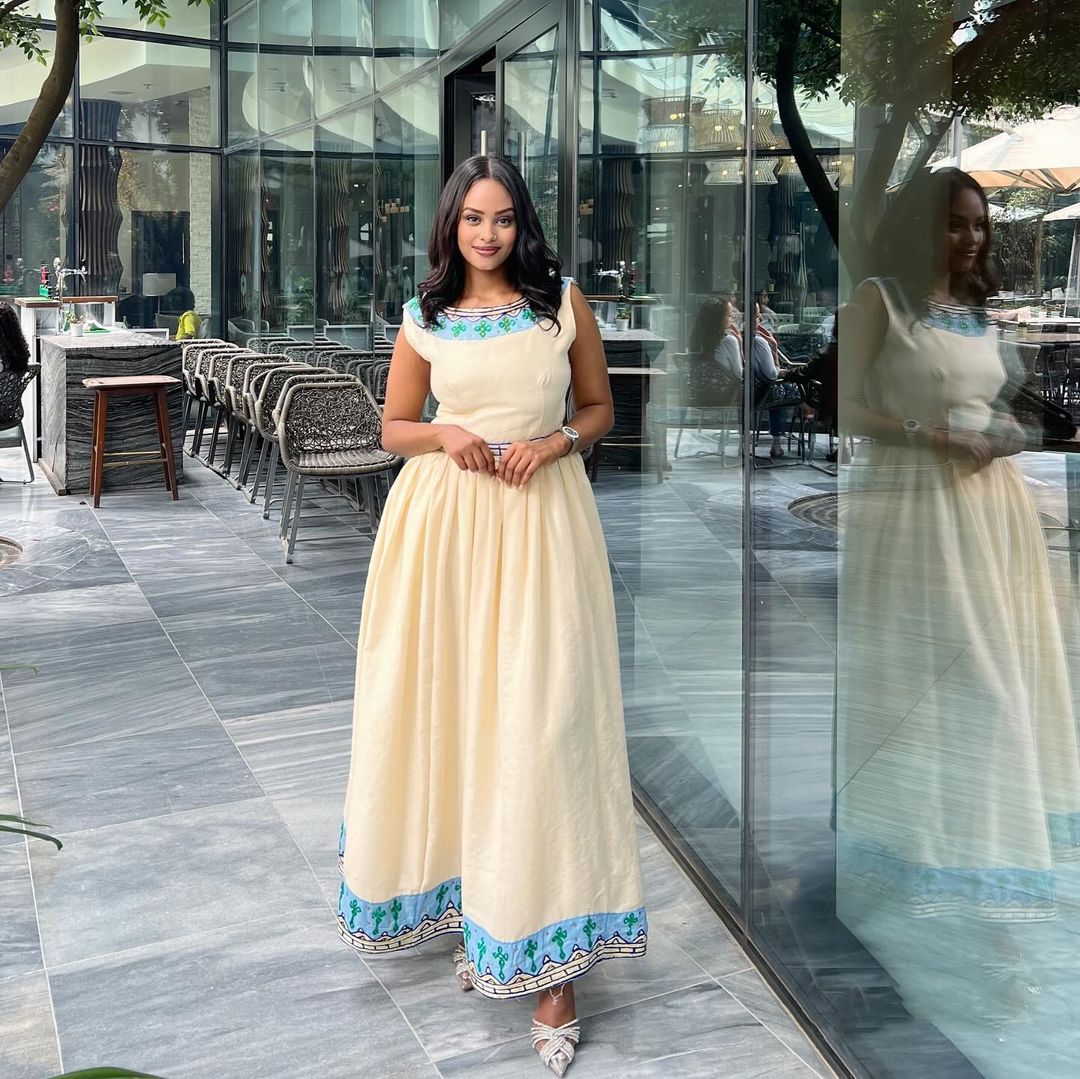 Modern Ethiopian Traditional Dress with Blue Design Elegant Habesha Dress