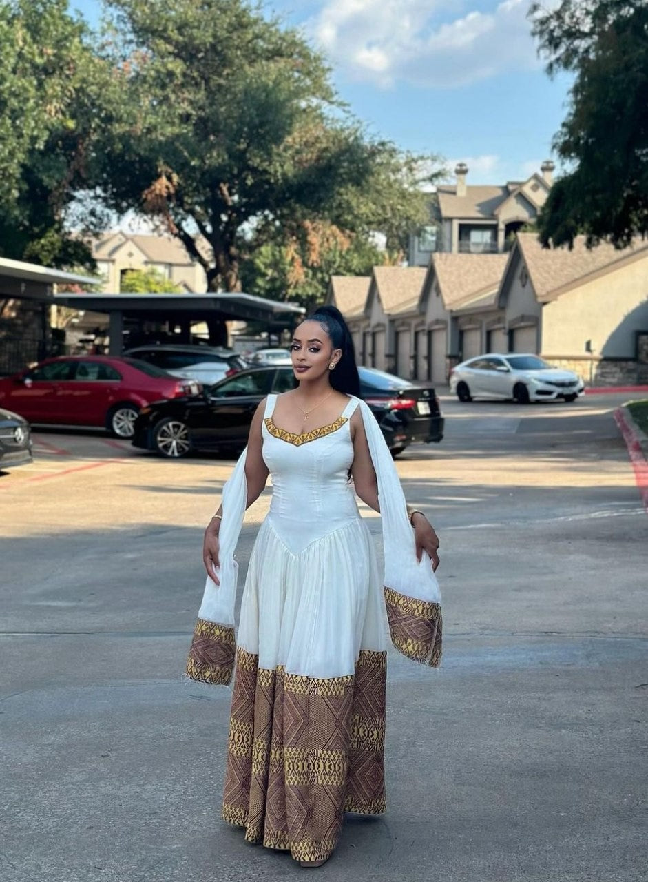 Golden Brown Sleeveless Chic Traditional Ethioipian Dress: with Geometric Hemline Designing Habesha Dress