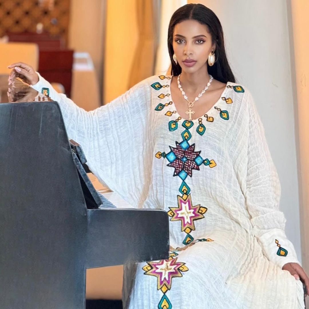 Vibrant Traditional Ethiopian Outfit :with Geometric and Colorful Embroidery Habesha Dress